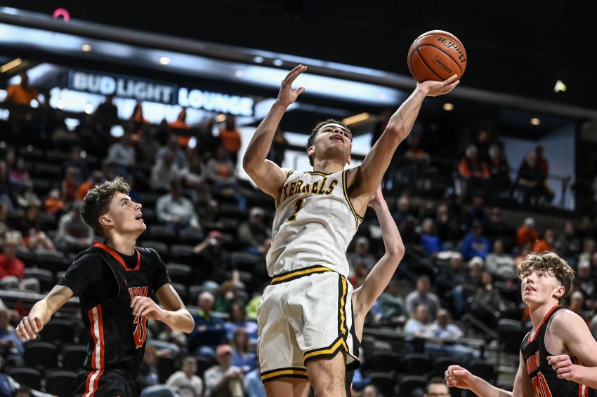 Kernels fend off a physical Huron, advance to semis