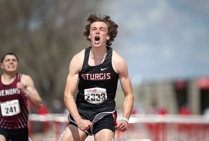 Sturgis senior Aidan Hedderman runs blistering 110-meter hurdles time, defends Howard Wood Relays title 